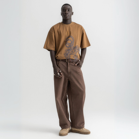 Unisex burnt brown box-fit tee with oversized distressed key graphic on the front