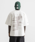 Unisex white box-fit tee in heavyweight Egyptian cotton with worn cassette tape graphic across the chest. and abstract equalizer design on back. 