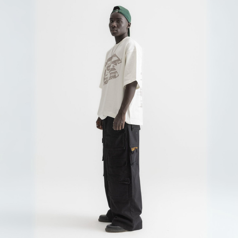 Unisex white box-fit tee in heavyweight Egyptian cotton with worn cassette tape graphic across the chest. and abstract equalizer design on back. 