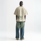 Unisex sage green box-fit tee with distressed BTO logo on chest and washed-out ENTROPY print wrapping from chest to back