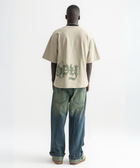 Unisex sage green box-fit tee with distressed BTO logo on chest and washed-out ENTROPY print wrapping from chest to back