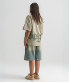 Unisex sage green box-fit tee with distressed BTO logo on chest and washed-out ENTROPY print wrapping from chest to back
