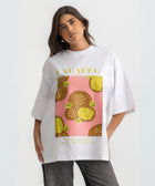 Oversized white t-shirt with bold Falafel illustration, 100% cotton.