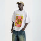 Oversized white t-shirt with bold Falafel illustration, 100% cotton.
