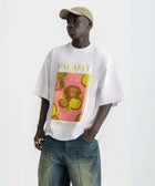 Oversized white t-shirt with bold Falafel illustration, 100% cotton.