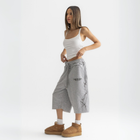 Unisex grey long shorts made of 100% cotton with raw hem edges and chunky waistband.