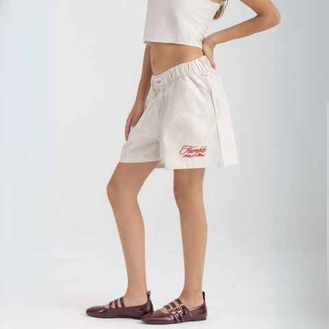 Unisex boxer-style shorts made from 100% breathable thick cotton. Featuring classic sailor stripes in ocean blue and white, rosé pink and white, or sand beige and white. Relaxed, slouchy fit with elastic waistband and adjustable drawstring for a comfortable, effortless look. Available in multiple colors.