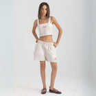 Unisex boxer-style shorts made from 100% breathable thick cotton. Featuring classic sailor stripes in ocean blue and white, rosé pink and white, or sand beige and white. Relaxed, slouchy fit with elastic waistband and adjustable drawstring for a comfortable, effortless look. Available in multiple colors.