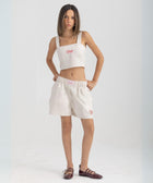 Unisex boxer-style shorts made from 100% breathable thick cotton. Featuring classic sailor stripes in ocean blue and white, rosé pink and white, or sand beige and white. Relaxed, slouchy fit with elastic waistband and adjustable drawstring for a comfortable, effortless look. Available in multiple colors.