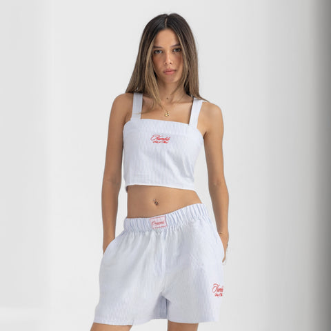 Striped Ocean Blue and White cropped cotton top with burgundy ‘Humble’ embroidery on front.