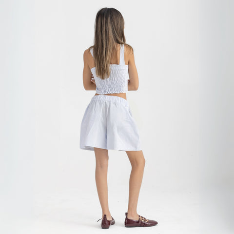 Striped Ocean Blue and White cropped cotton top with burgundy ‘Humble’ embroidery on front.