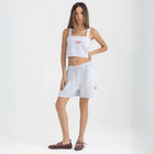 Striped Ocean Blue and White cropped cotton top with burgundy ‘Humble’ embroidery on front.