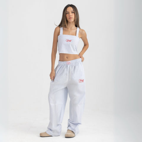 Striped Ocean Blue and White cropped cotton top with burgundy ‘Humble’ embroidery on front.