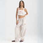 Striped Sand Beige and White cropped cotton top with burgundy ‘Humble’ embroidery on front.