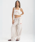 Striped Sand Beige and White cropped cotton top with burgundy ‘Humble’ embroidery on front.