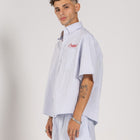 Unisex boxer-style shorts made from 100% breathable thick cotton. Featuring classic sailor stripes in ocean blue and white, rosé pink and white, or sand beige and white. Relaxed, slouchy fit with elastic waistband and adjustable drawstring for a comfortable, effortless look. Available in multiple colors.