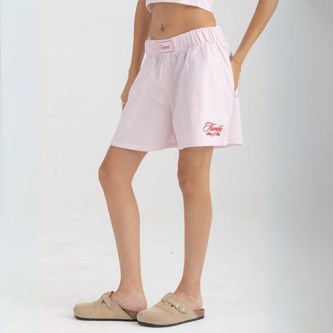 Unisex boxer-style shorts made from 100% breathable thick cotton. Featuring classic sailor stripes in ocean blue and white, rosé pink and white, or sand beige and white. Relaxed, slouchy fit with elastic waistband and adjustable drawstring for a comfortable, effortless look. Available in multiple colors.