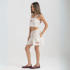 Unisex boxer-style shorts made from 100% breathable thick cotton. Featuring classic sailor stripes in ocean blue and white, rosé pink and white, or sand beige and white. Relaxed, slouchy fit with elastic waistband and adjustable drawstring for a comfortable, effortless look. Available in multiple colors.