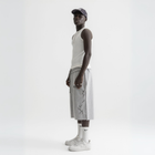 Unisex grey long shorts made of 100% cotton with raw hem edges and chunky waistband.