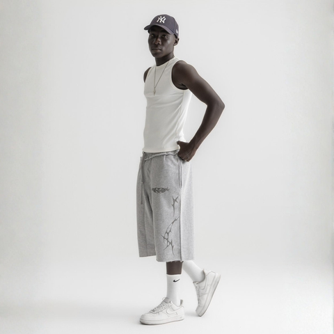 Men’s white ribbed tank top, front view showcasing fitted silhouette and minimal design