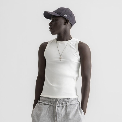 Men’s white ribbed tank top, front view showcasing fitted silhouette and minimal design
