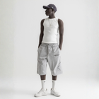 Men’s white ribbed tank top, front view showcasing fitted silhouette and minimal design