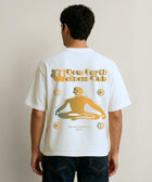 Boxy fit white cotton t-shirt with orange gradient print on the front and back.