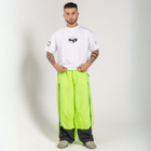 Unisex wide-fit waterproof pants in soft polyester with side stripe logo and adjustable waistband.