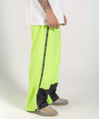 Unisex wide-fit waterproof pants in soft polyester with side stripe logo and adjustable waistband.