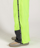 Unisex wide-fit waterproof pants in soft polyester with side stripe logo and adjustable waistband.