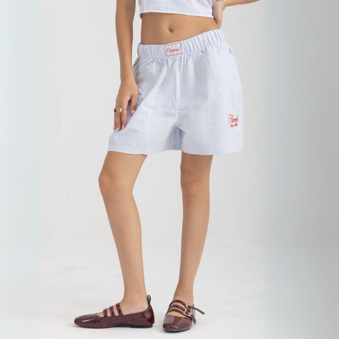Unisex boxer-style shorts made from 100% breathable thick cotton. Featuring classic sailor stripes in ocean blue and white, rosé pink and white, or sand beige and white. Relaxed, slouchy fit with elastic waistband and adjustable drawstring for a comfortable, effortless look. 