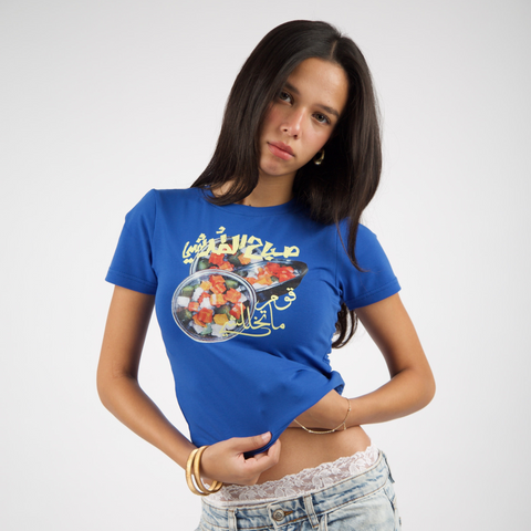 Sabah El torshy Morning Market baby tee – in blue with colorful silk-screen pickles front print, BTX x Nada Sultan