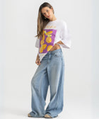 Oversized white t-shirt with bold Termes illustration, 100% cotton.