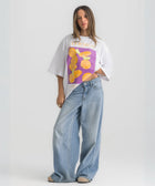 Oversized white t-shirt with bold Termes illustration, 100% cotton.