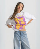 Oversized white t-shirt with bold Termes illustration, 100% cotton.