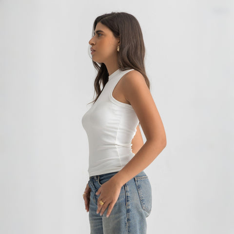 white ribbed basic tank top for women, side view showcasing fitted silhouette and minimal design.