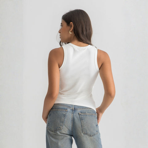 white ribbed basic tank top for women, back view showcasing fitted silhouette and minimal design.